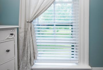 Faux Wood Blinds in a Cozy Bedroom