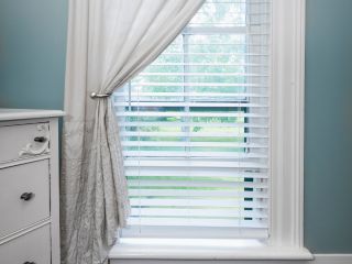 Faux Wood Blinds in a Cozy Bedroom