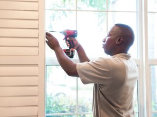 Skilled Technicians Repairing Window Coverings in Irvine